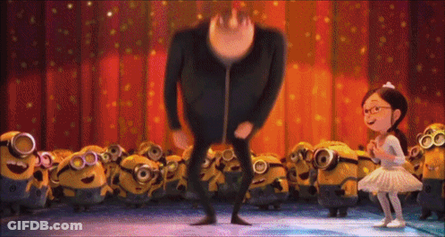 A Girl In A Tutu Stands Next To A Man In A Black Jacket GIF