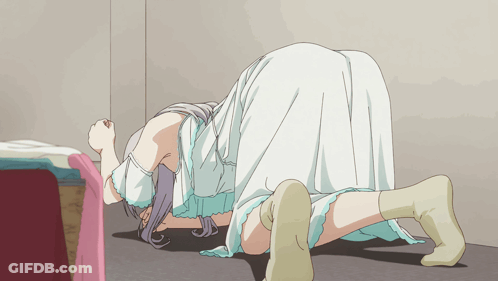 A Girl In A White Dress Is Kneeling Down GIF
