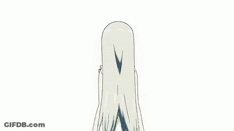 A Girl In A White Dress Is Standing In A Forest With Flowers Falling From The Trees . GIF