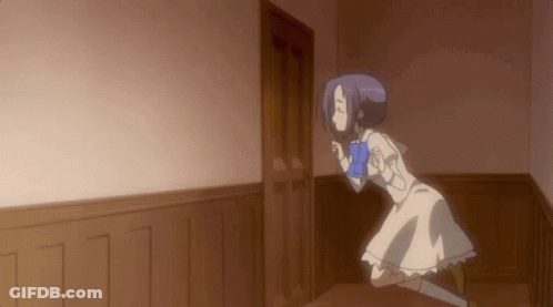 A Girl In A White Dress Stands In A Hallway GIF