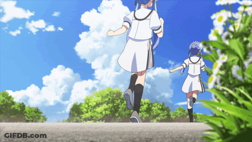 A Girl In A White Dress With The Letter T On It Is Running With Another Girl GIF
