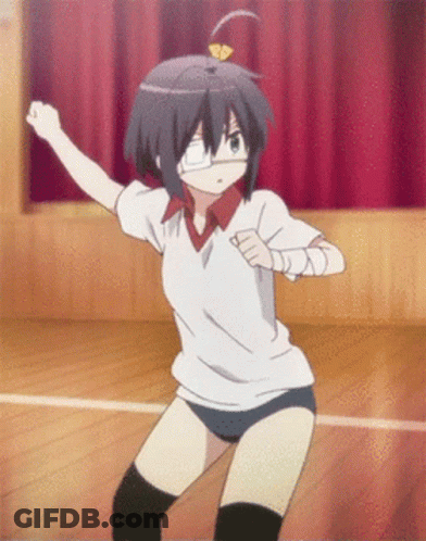 A Girl In A White Shirt And Blue Shorts Is Dancing In A Gym GIF