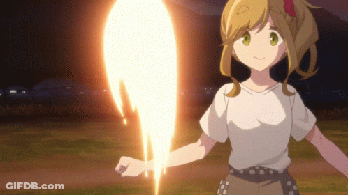 A Girl In A White Shirt Is Holding A Fireball GIF