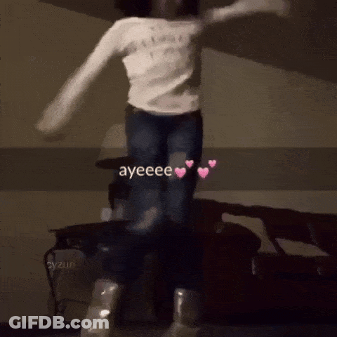 A Girl In A White Shirt Is Jumping In The Air With The Words Ayeeee Written On The Bottom GIF