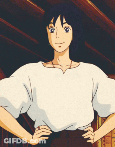 A Girl In A White Shirt With Her Hands On Her Hips Looks At The Camera GIF