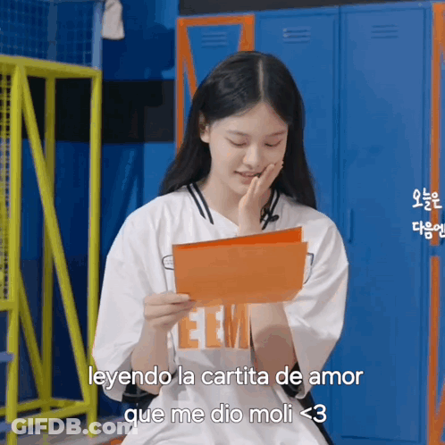 A Girl In A White Shirt With The Word Eem On It GIF