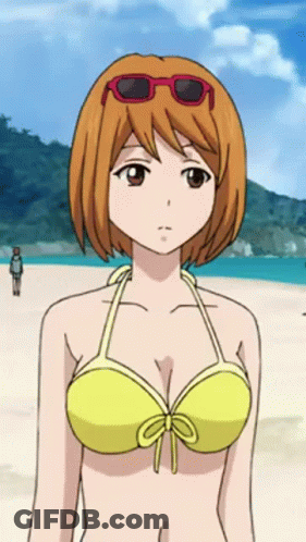 A Girl In A Yellow Bikini And Red Sunglasses Stands On The Beach GIF