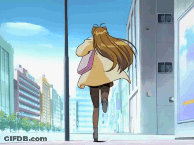 A Girl In A Yellow Coat Is Running Down A City Street GIF