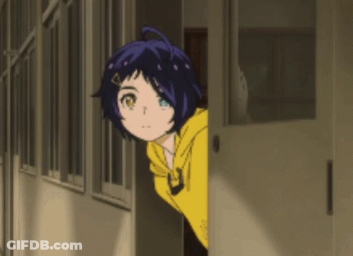 A Girl In A Yellow Hoodie Peeking Out From Behind A Door GIF
