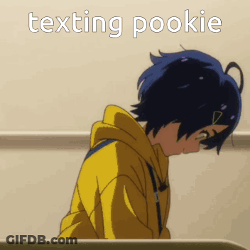 A Girl In A Yellow Hoodie With The Words Texting Pookie Written On It GIF
