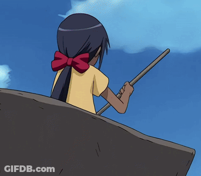 A Girl In A Yellow Shirt With A Red Bow On Her Back Is Holding A Stick GIF