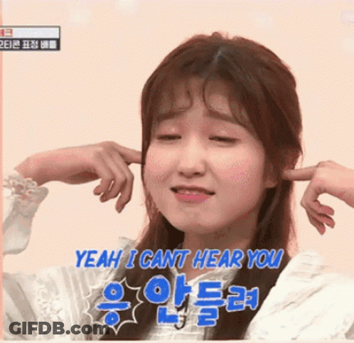 A Girl Is Covering Her Ears With Her Hands And The Words Yeah I Cant Hear You Are Above Her GIF