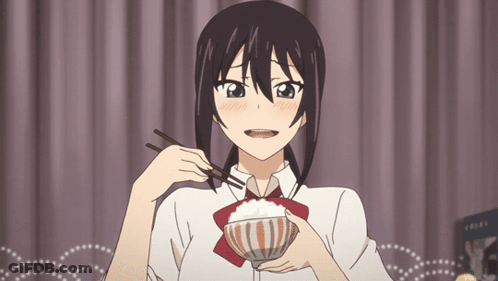 A Girl Is Holding A Bowl Of Rice With Chopsticks In Her Mouth GIF