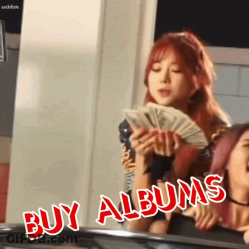 A Girl Is Holding A Bunch Of Money And The Words Buy Albums Are Above Her GIF