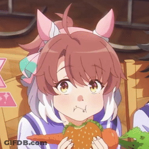A Girl Is Holding A Carrot And Lettuce In Her Hands GIF