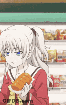 A Girl Is Holding A Loaf Of Bread In Her Hands GIF