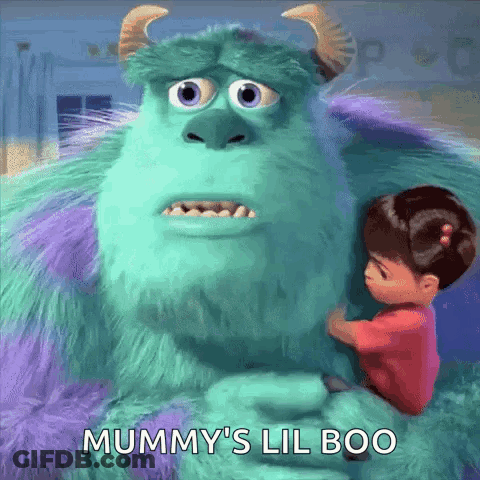 A Girl Is Hugging A Monster From Monsters Inc . GIF