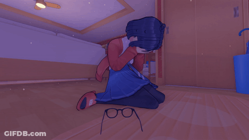 A Girl Is Kneeling Down With A Pair Of Glasses On The Floor In Front Of Her GIF