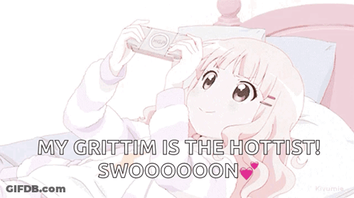 A Girl Is Laying On A Bed Playing A Video Game And The Caption Says My Grittim Is The Hottest Swoooooon GIF