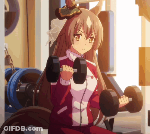A Girl Is Lifting Dumbbells In A Gym GIF