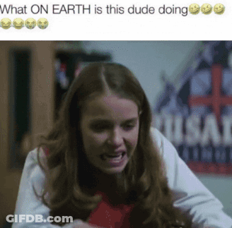 A Girl Is Making A Funny Face And The Caption Says What On Earth Is This Dude Doing GIF