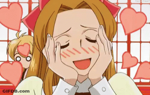 A Girl Is Making A Funny Face With Her Hands On Her Face And Hearts Flying Around Her . GIF