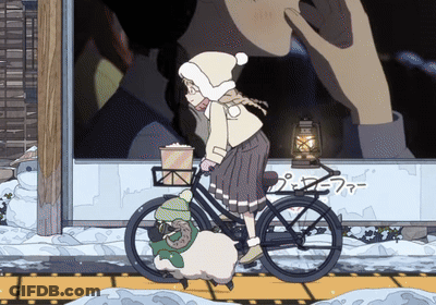 A Girl Is Riding A Bike With A Sheep On The Front GIF