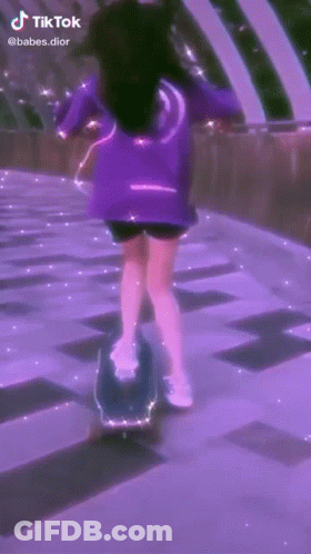 A Girl Is Riding A Skateboard On A Purple Background . GIF
