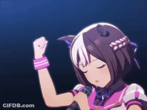 A Girl Is Singing Into A Microphone With Her Eyes Closed And Her Fist In The Air GIF