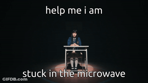 A Girl Is Sitting At A Desk With The Words Help Me I Am Stuck In The Microwave Below Her GIF