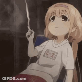 A Girl Is Sitting In A Chair Holding A Lighter And Smiling . GIF
