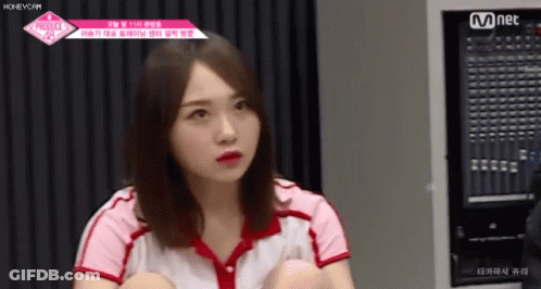 A Girl Is Sitting In Front Of A Mnet Mixer GIF
