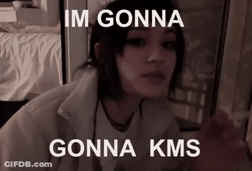 A Girl Is Sitting In Front Of A Window With The Words `` Im Gonna Gonna Kms '' On Her Face . GIF
