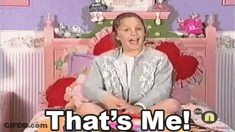 A Girl Is Sitting On A Bed And Saying That 'S Me GIF
