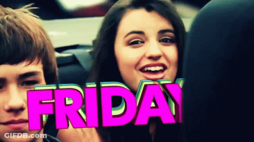 A Girl Is Smiling In Front Of A Pink Friday Sign GIF
