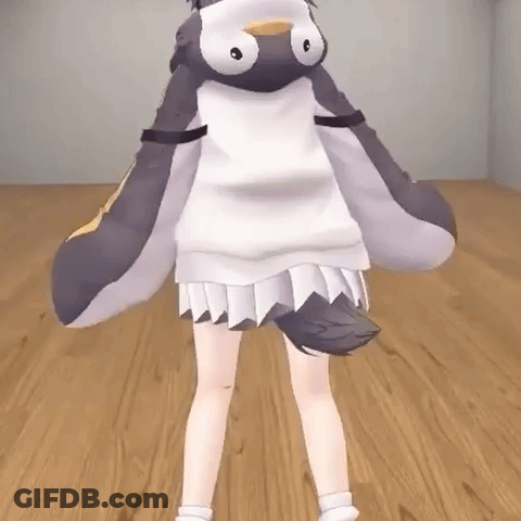 A Girl Is Standing In A Room Wearing A Penguin Costume . GIF