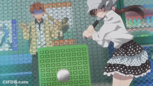 A Girl Is Swinging A Bat At A Baseball Behind A Fence GIF