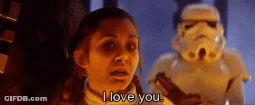 A Girl Is Talking To A Stormtrooper In A Star Wars Movie . GIF