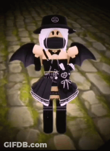 A Girl Is Wearing A Black Hat And A Black Dress With Wings . GIF