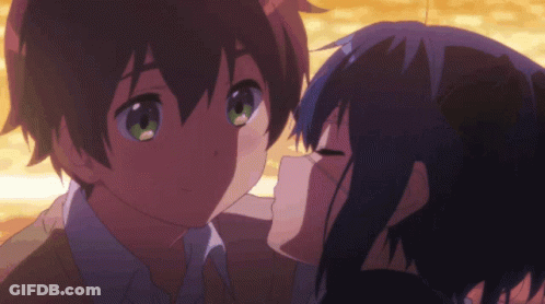 A Girl Kissing A Boy On The Cheek In A Cartoon GIF