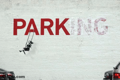 A Girl On A Swing Is Painted On A White Wall With The Word Parking GIF