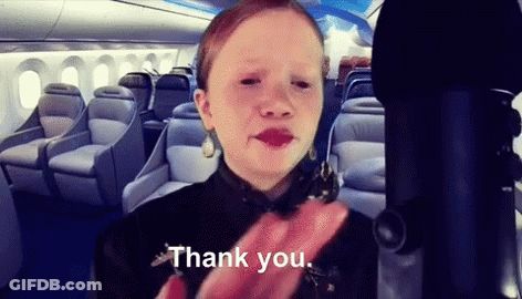 A Girl On An Airplane Says Thank You GIF