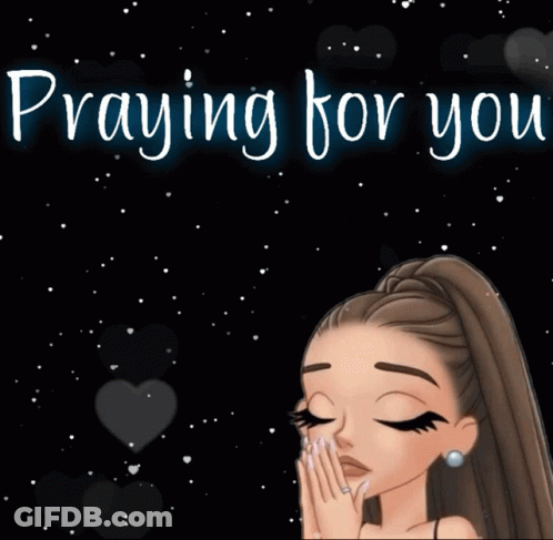 A Girl Praying With The Words Praying For You Behind Her GIF