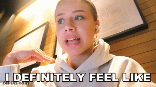 A Girl Says I Definitely Feel Like While Wearing A Hoodie GIF