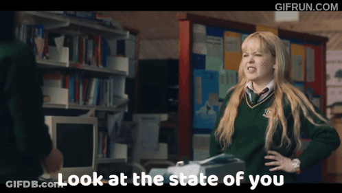 A Girl Says Look At The State Of You While Standing In A Library GIF