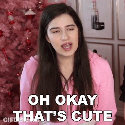 A Girl Says Oh Okay That 'S Cute In Front Of A Pink Tree GIF