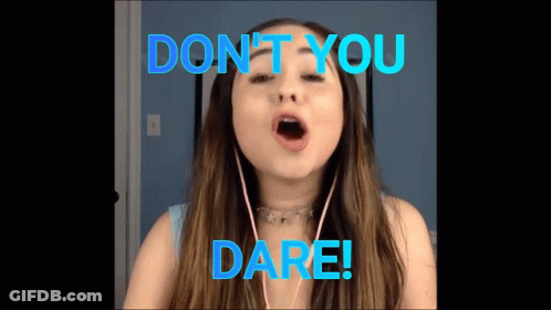 A Girl Singing A Song With The Words Do N't You Dare GIF
