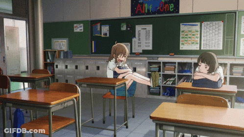 A Girl Sits At A Desk In A Classroom With A Sign That Says All For One GIF