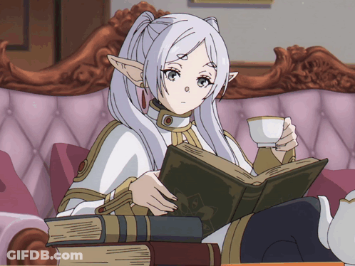 A Girl Sitting On A Couch Reading A Book And Drinking From A Cup GIF