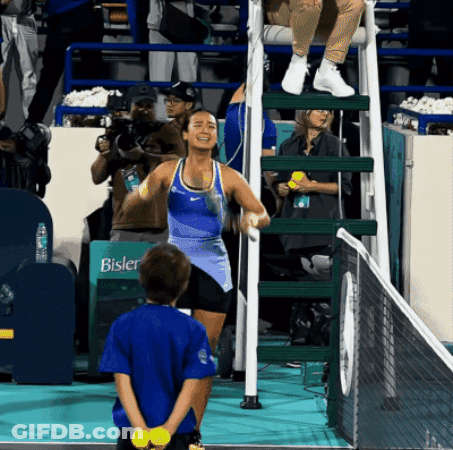 A Girl Stands In Front Of A Sign That Says Bisler On It GIF
